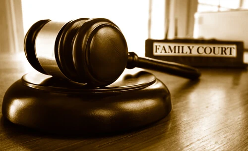 Judge's legal gavel and Family Court nameplate