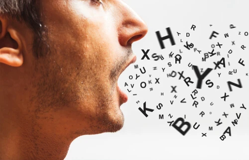 close up of a young man speaks - words power - watch your words concept